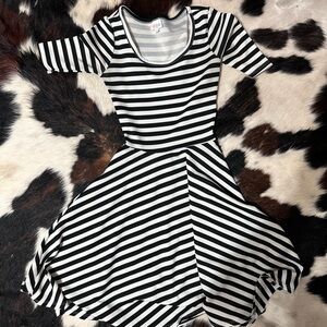 Buy 2 get 1 free SALE

NWOT LulaRoe XXS Dress